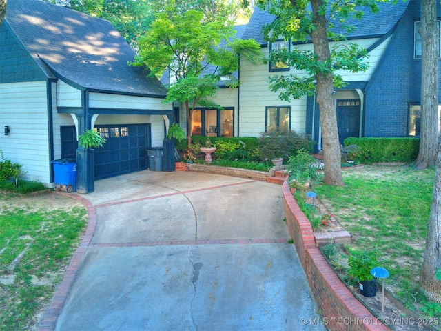 8918 S Lakewood Ave, Tulsa, OK 74137 - view of front of home with driveway and a garage