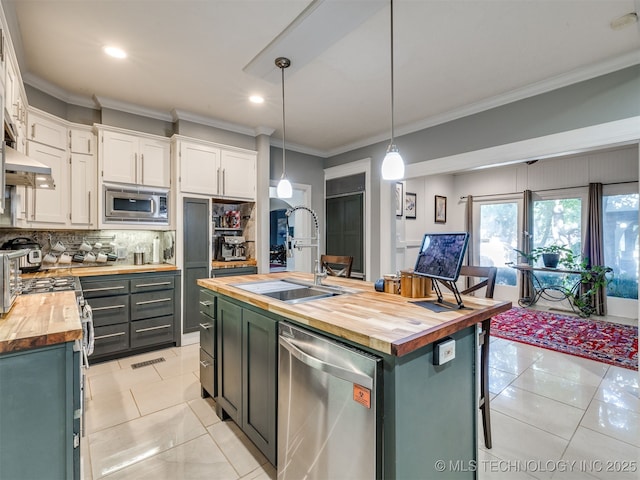 8918 S Lakewood Ave, Tulsa, OK 74137 - kitchen featuring butcher block countertops, stainless steel appliances, light tile patterned flooring, crown molding, and decorative backsplash