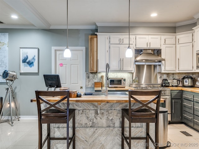 8918 S Lakewood Ave, Tulsa, OK 74137 - kitchen with wall chimney range hood, ornamental molding, decorative backsplash, stainless steel stove, and white cabinets