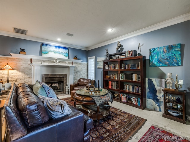 8918 S Lakewood Ave, Tulsa, OK 74137 - living area featuring crown molding, a glass covered fireplace, tile patterned flooring, and recessed lighting