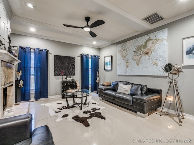 8918 S Lakewood Ave, Tulsa, OK 74137 - living area with ceiling fan, crown molding, recessed lighting, and a fireplace with raised hearth