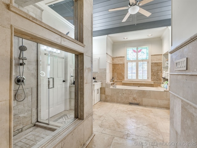 8918 S Lakewood Ave, Tulsa, OK 74137 - full bathroom featuring crown molding, a garden tub, a shower stall, and a ceiling fan