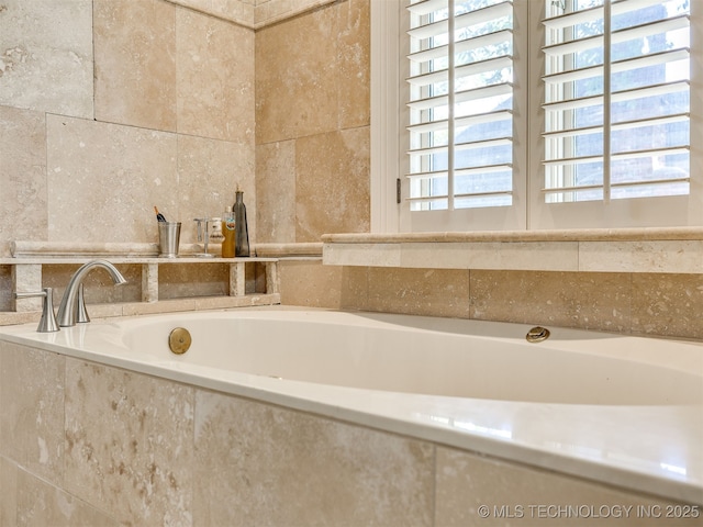 8918 S Lakewood Ave, Tulsa, OK 74137 - bathroom featuring a garden tub and tile walls