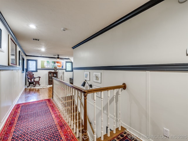 8918 S Lakewood Ave, Tulsa, OK 74137 - stairs with wood finished floors, ceiling fan, a decorative wall, and recessed lighting