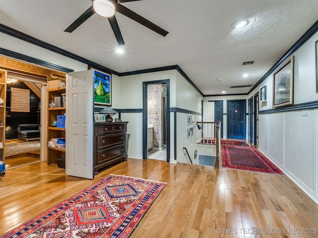 8918 S Lakewood Ave, Tulsa, OK 74137 - foyer with crown molding, a ceiling fan, wood finished floors, and recessed lighting