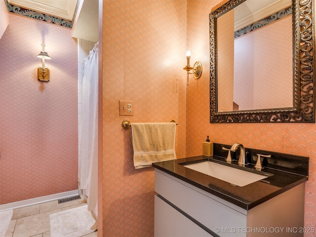 8918 S Lakewood Ave, Tulsa, OK 74137 - bathroom featuring vanity, wallpapered walls, tile patterned flooring, and a shower with curtain