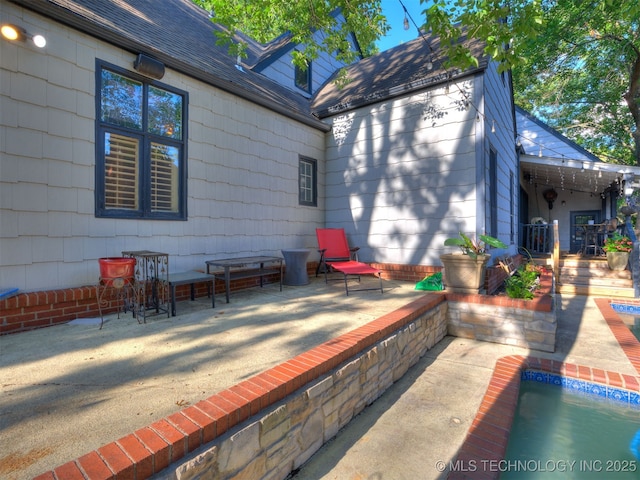 8918 S Lakewood Ave, Tulsa, OK 74137 - view of patio featuring an outdoor pool