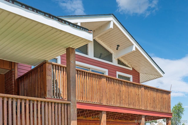 view of side of property featuring a balcony