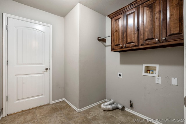 washroom featuring cabinets, washer hookup, and hookup for an electric dryer