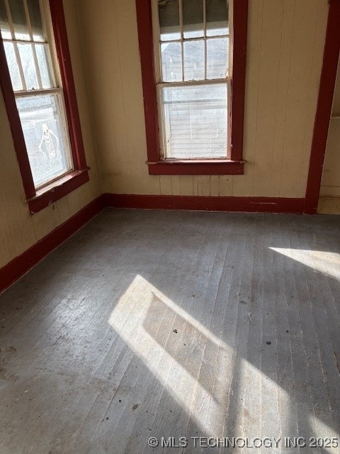 empty room featuring hardwood / wood-style flooring