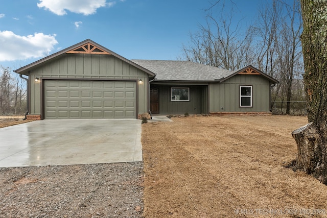 ranch-style house featuring a garage