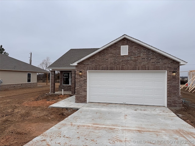 view of front of property featuring a garage