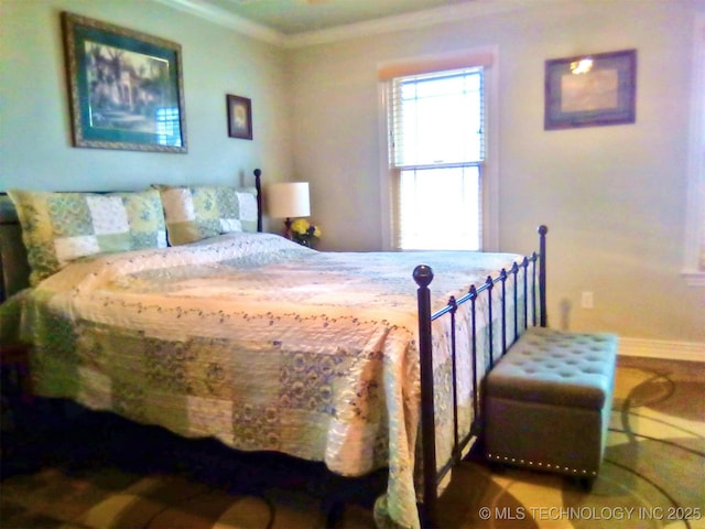 bedroom featuring crown molding