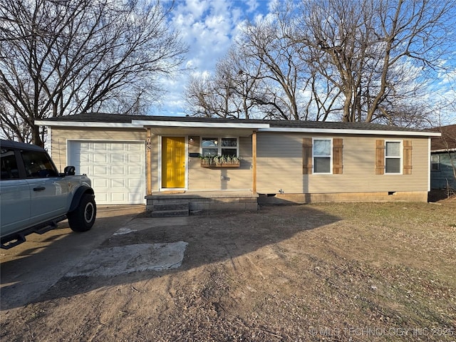 single story home featuring a garage