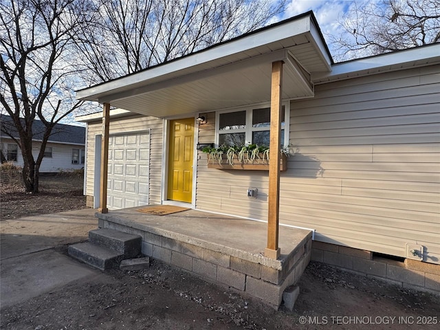 property entrance with a garage