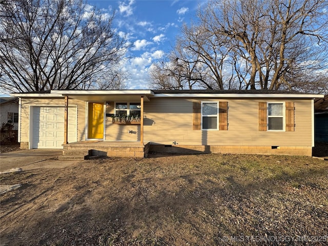 view of front of property featuring a garage and covered porch