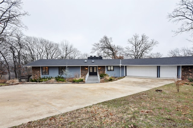 single story home with a garage