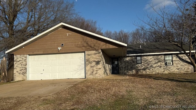 single story home with a garage