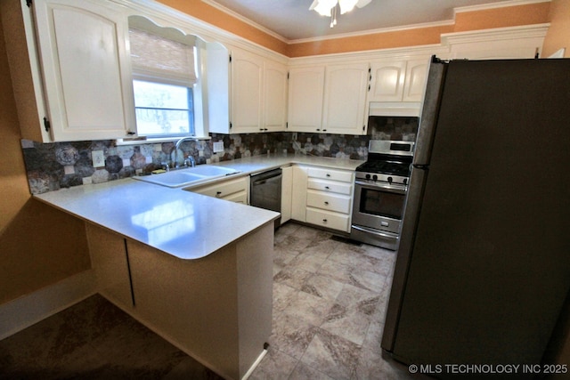 kitchen featuring sink, stainless steel appliances, kitchen peninsula, and white cabinets