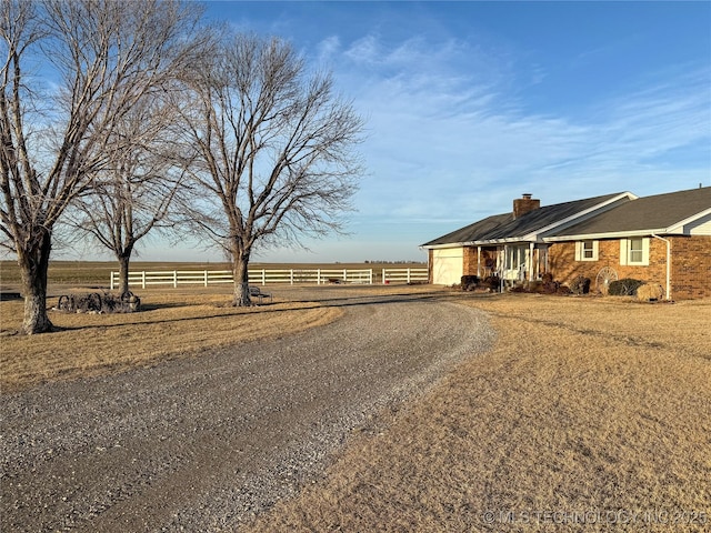 view of road featuring a rural view