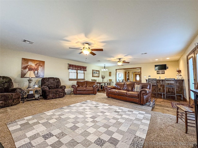 living room with ceiling fan