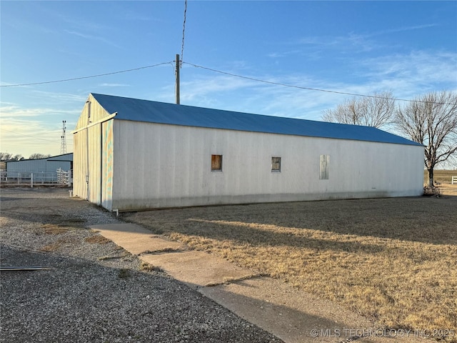 view of outdoor structure with a yard