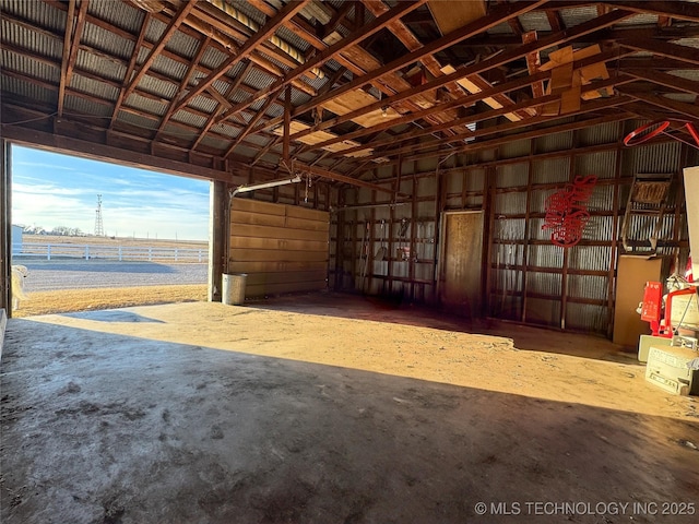 view of stable featuring a water view