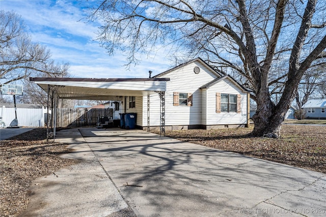 view of front of property with a carport