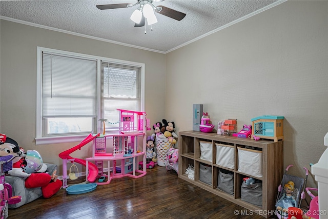 playroom with ornamental molding, ceiling fan, a textured ceiling, and dark hardwood / wood-style flooring