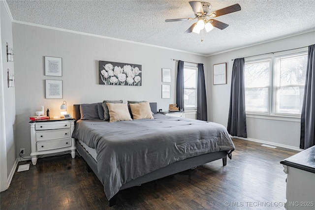 bedroom featuring crown molding, dark hardwood / wood-style floors, and a textured ceiling