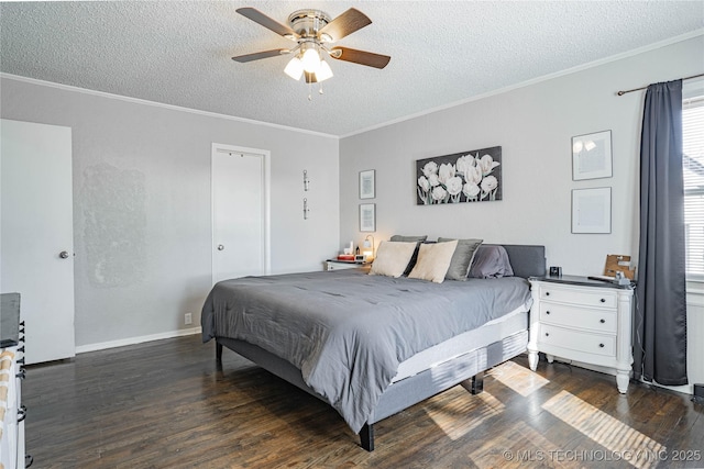 bedroom with crown molding, dark wood-type flooring, and a textured ceiling