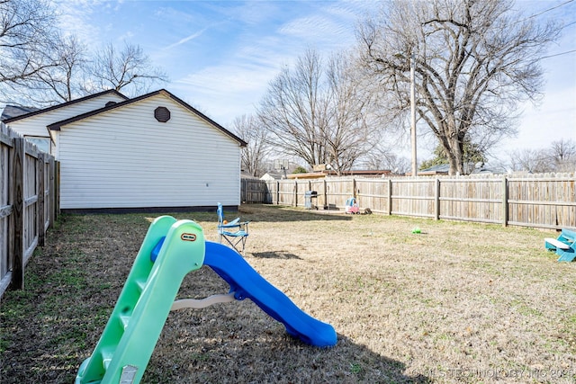 view of yard featuring a playground