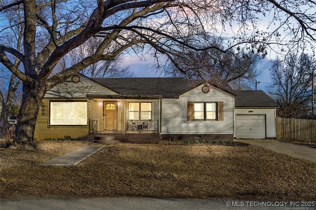 ranch-style house featuring a garage