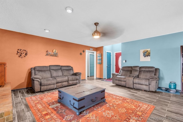 living room with ceiling fan