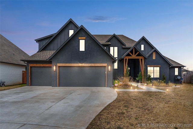 view of front of property with a garage