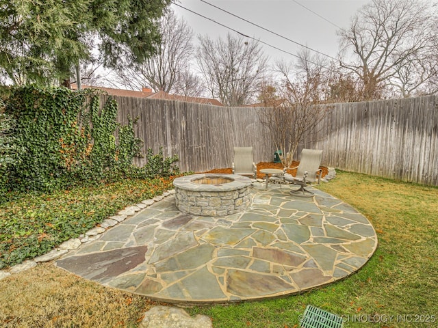 view of patio featuring a fire pit