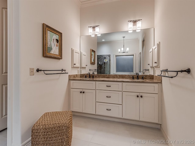 bathroom featuring tile patterned flooring, ornamental molding, vanity, and walk in shower