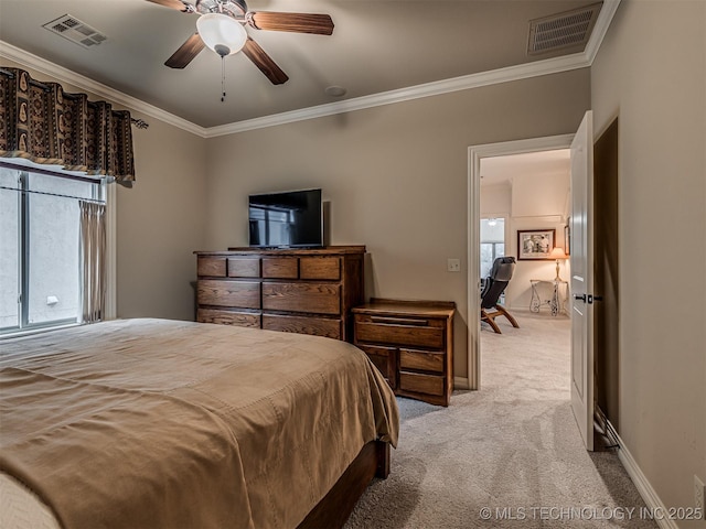 carpeted bedroom featuring ceiling fan and ornamental molding