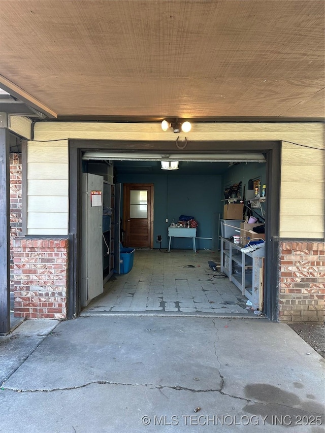 garage featuring a garage door opener