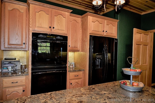 kitchen featuring stone counters, tasteful backsplash, light brown cabinetry, and black appliances