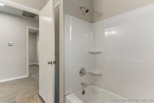 bathroom with shower / bathing tub combination