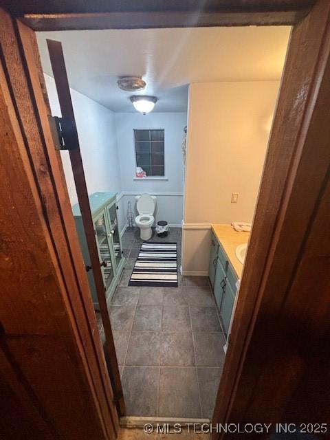 bathroom featuring vanity and tile patterned flooring