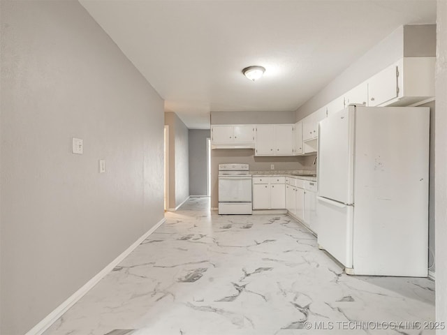 kitchen featuring white cabinetry and white appliances