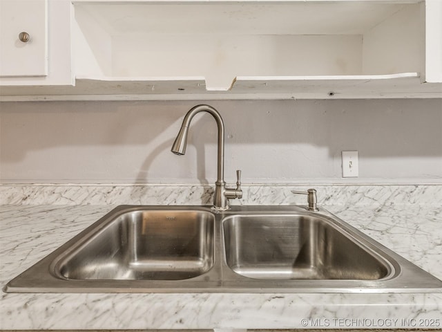 room details with sink and white cabinets