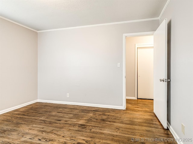 unfurnished room featuring crown molding, dark hardwood / wood-style floors, and a textured ceiling