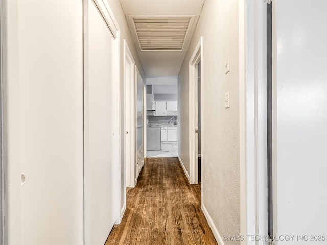 hall featuring wood-type flooring