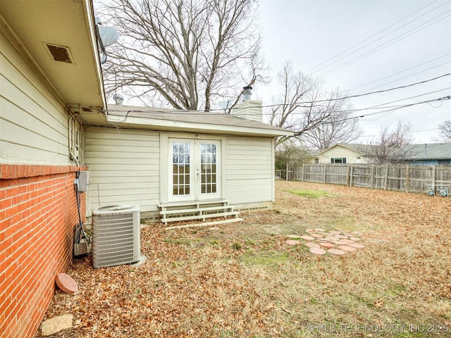 view of yard with central AC