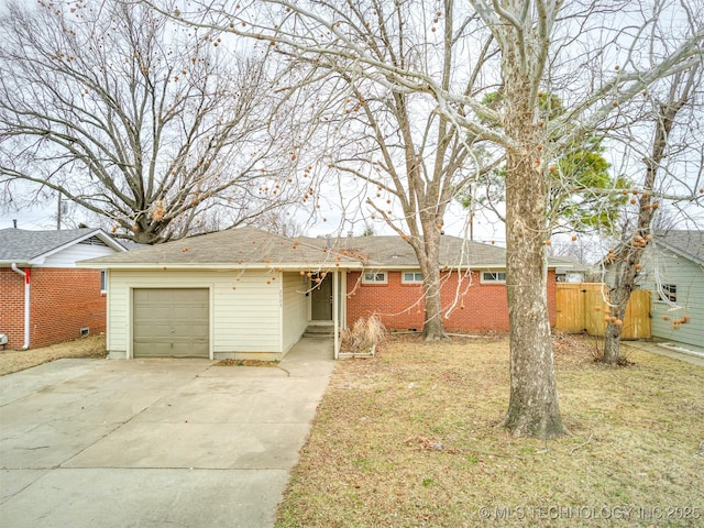 ranch-style home featuring a front yard