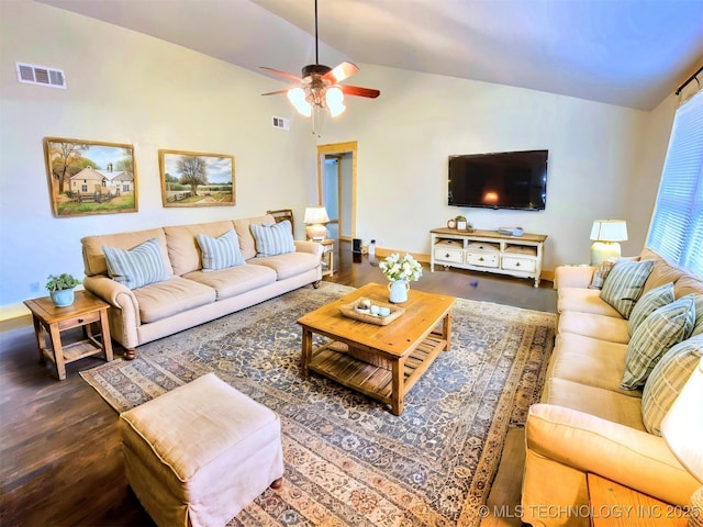 living room with lofted ceiling, dark hardwood / wood-style floors, and ceiling fan