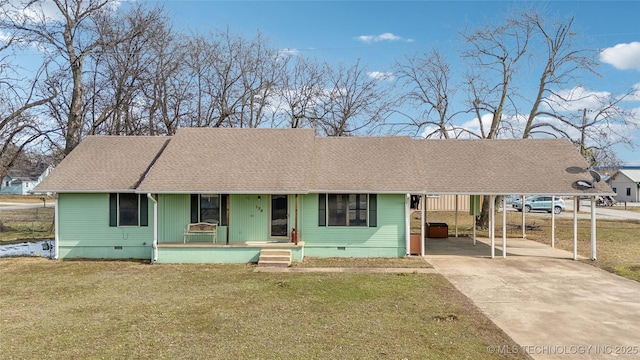 single story home with a front lawn, a carport, and a porch